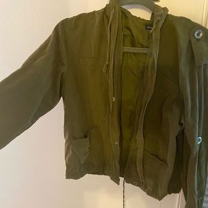 Green hooded lightweight jacket